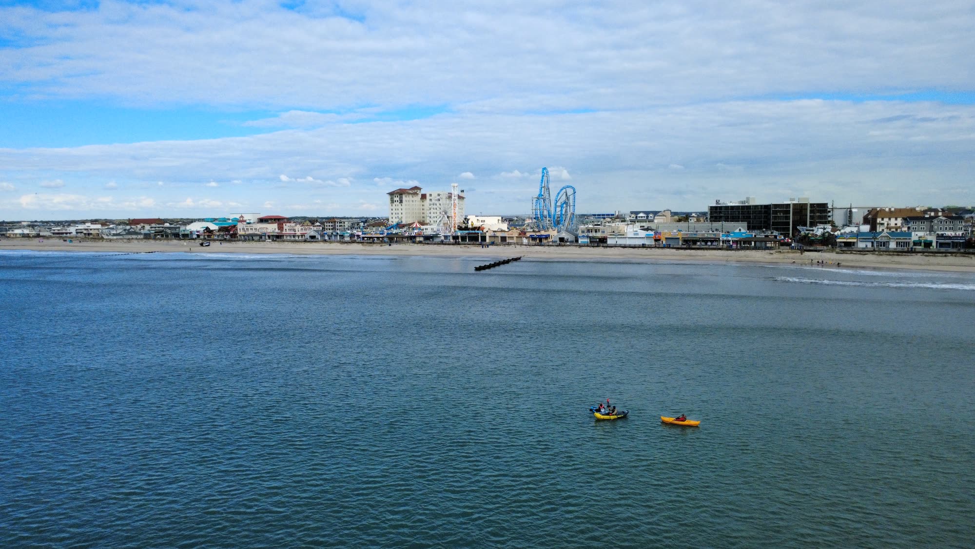The Ocean City coastline seen from over the Atlantic, kayakers offshore